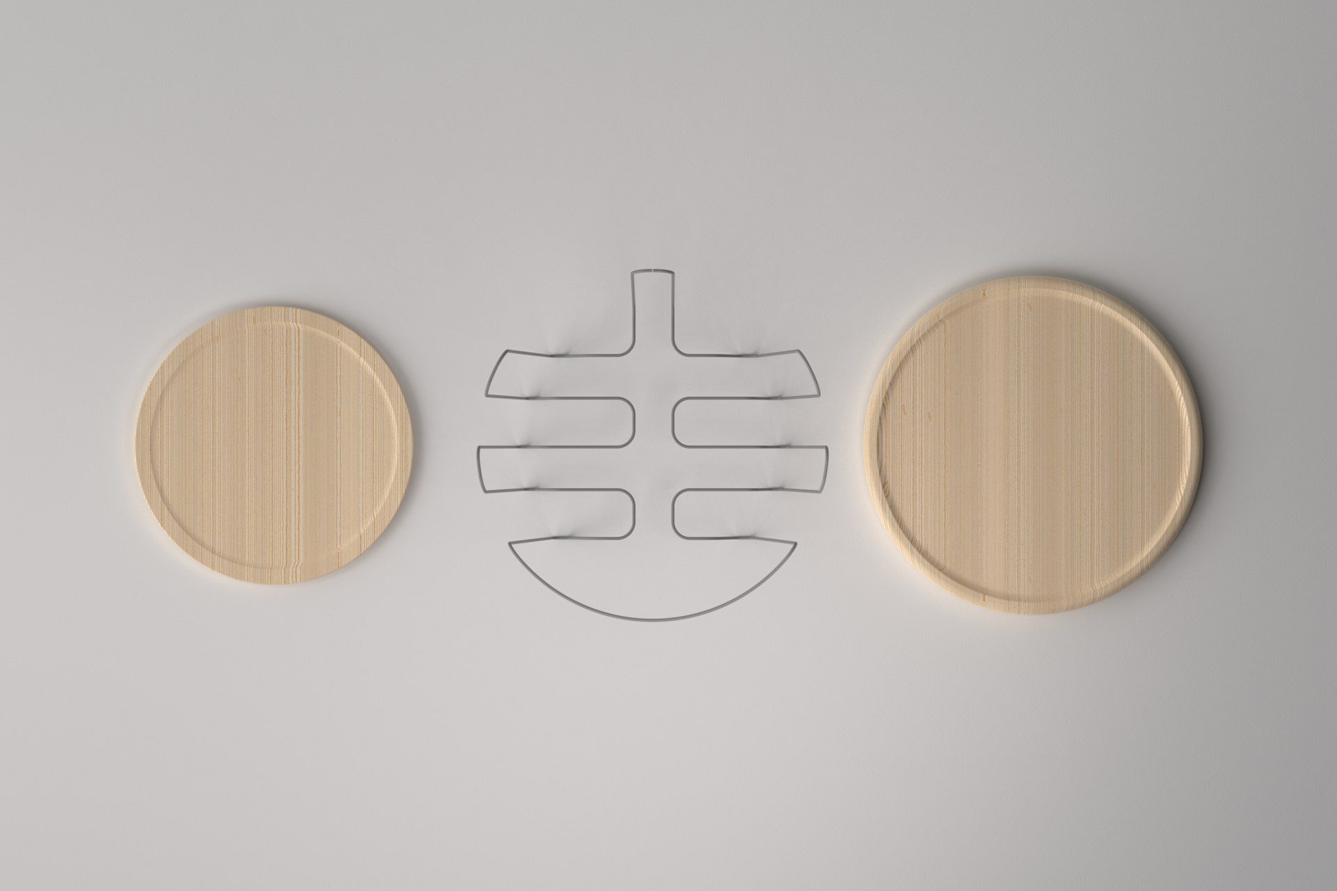 The 2020 design laid flat: two oak discs either side of one bent-wire frame piece