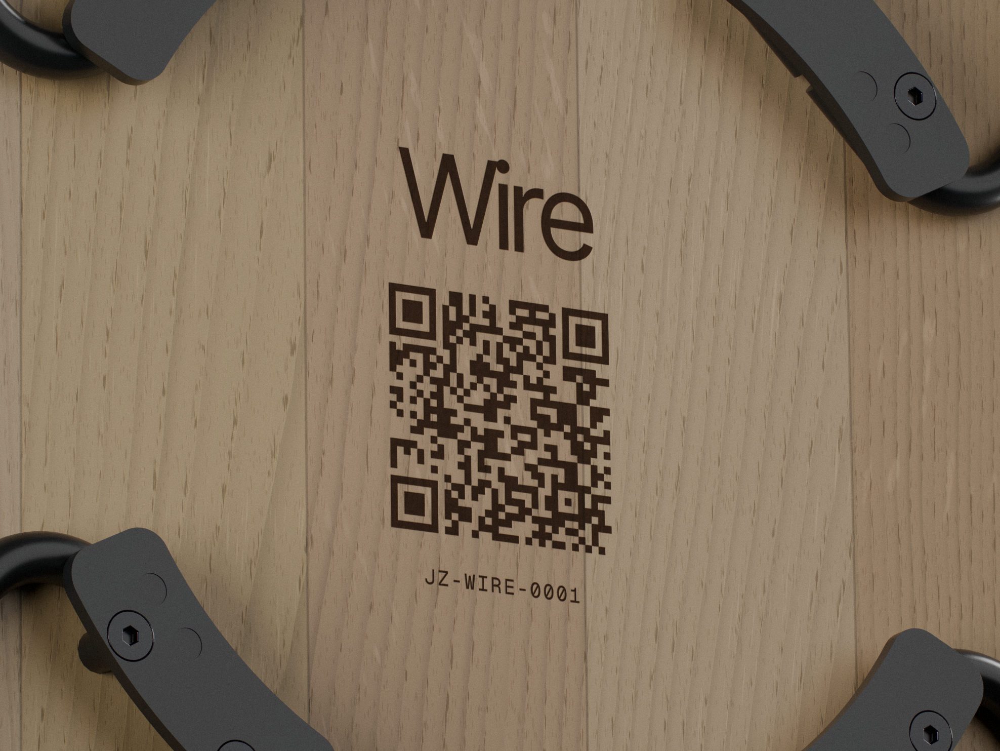 Close-up of the etch: the Wire wordmark, a 40 mm QR code and the passport ID JZ-WIRE-0001 burned into the oak